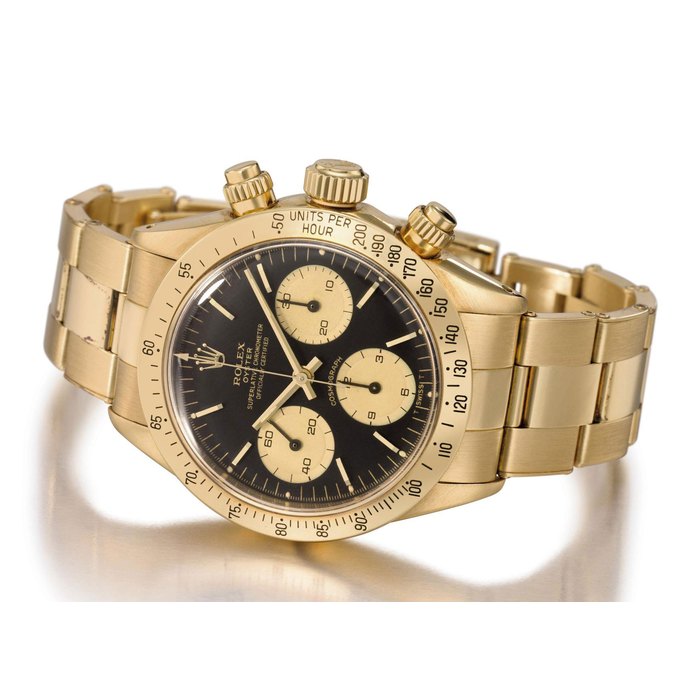 Rolex. A fine 18K gold chronograph wristwatch with bracelet SIGNED ROLEX, OYSTER, COSMOGRAPH, DAYTONA MODEL, REF. 6265, CASE NO. 5'027'712, MANUFACTURED IN 1976