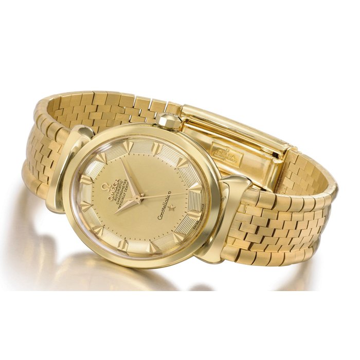 Omega. A fine 18K gold automatic wristwatch with sweep centre seconds, hooded lugs, two-tone gold dial, bracelet and associated case SIGNED OMEGA, AUTOMATIC, CONSTELLATION, REF. 14365 SC, MOVEMENT NO. 16'710'752, CASE NO. 121'651, CIRCA 1960