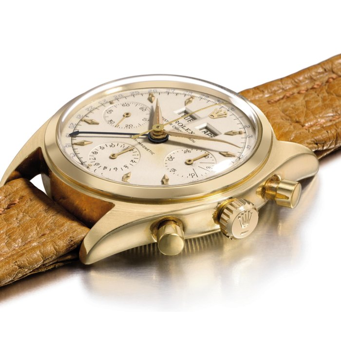 Rolex. A very fine and extremely rare 18K gold triple calendar chronograph wristwatch with luminous hands and hour markers SIGNED ROLEX, OYSTER CHRONOGRAPH, ANTI-MAGNETIC, REF. 6036, CASE NO. 917'844, MANUFACTURED IN 1952
