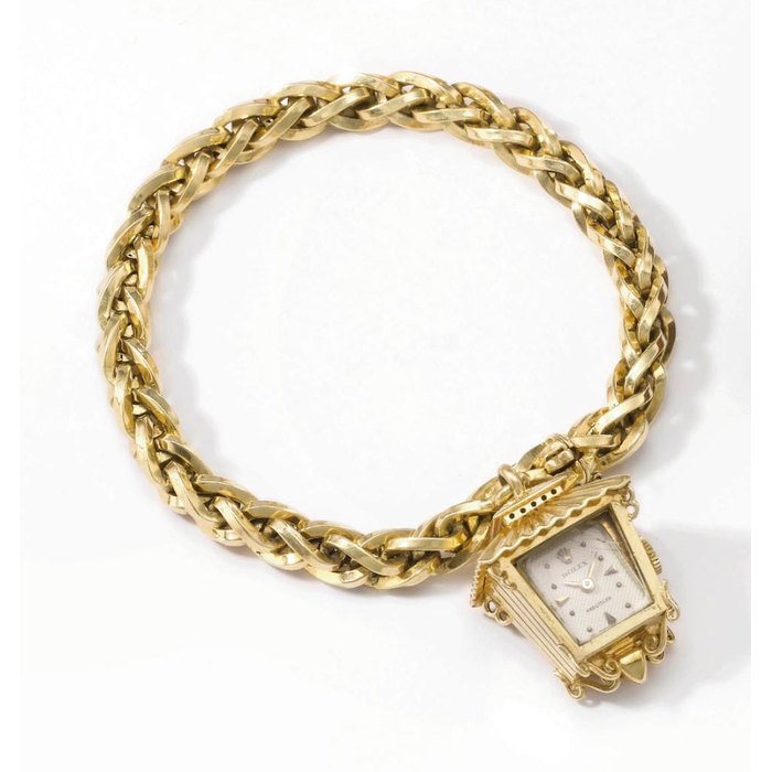 Rolex. An unusual 18K gold lantern-form bracelet watch SIGNED ROLEX, PRECISION, REF. 160, CASE NOS. 261 AND 8784, MANUFACTURED IN 1955