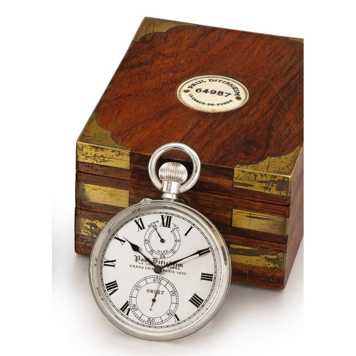 Ditisheim. A rare silver openface keyless lever deck watch with Guillaume balance, power reserve, Neuchâtel Bulletin d'Observatoire and two boxes SIGNED PAUL DITISHEIM, LA CHAUX-DE-FONDS, SWITZERLAND, GRAND PRIX PARIS 1900, THE HIGHEST RECORDS AT KEW TEDDINGTON AND SWISS OBSERVATORIES, THE FIRST PRIZE OF THE STATE IN THE POCKET CHRONOMETER CONTEST AT NEUCHÂTEL OBSERVATORY IN 1921, NO. 64'987, CASE STAMPED GS FOR THE GOLDSMITHS AND SILVERSMITHS CO. LTD. AND WITH LONDON IMPORT LETTER FOR 1919