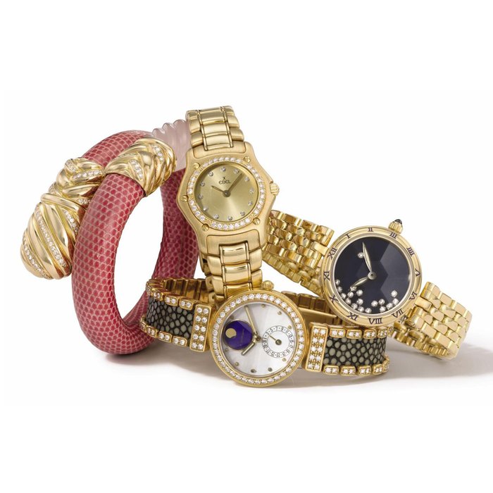 Barthelay, Corum, Gerald Genta, Ebel. A lot of five lady's 18K gold and diamond-set wristwatches SIGNED BARTHELAY, CORUM, GERALD GENTA, QUARTZ AND EBEL, 1911, ALL CIRCA 1995