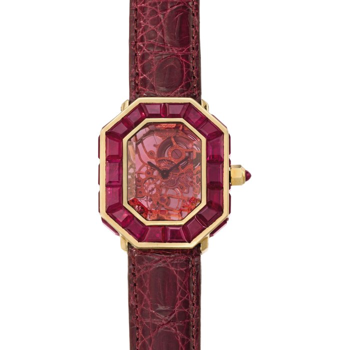 Cartier. A unique 18K gold and ruby-set octagonal skeletonized wristwatch SIGNED CARTIER, CASE NO. 226'286, CIRCA 1980