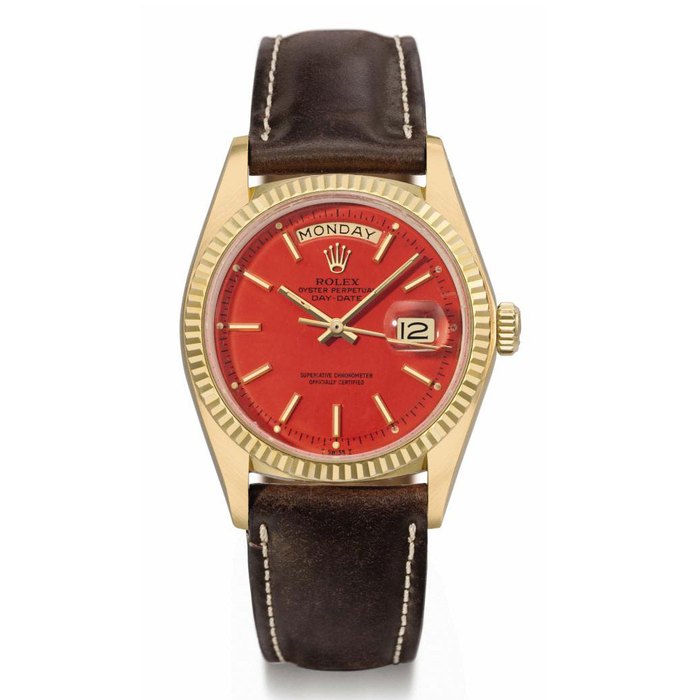 Rolex. An attractive 18K gold automatic calendar wristwatch with sweep centre seconds and coral-red lacquered dial SIGNED ROLEX, OYSTER PERPETUAL DAY-DATE, REF. 1803, CASE NO. 5'063'633, MANUFACTURED IN 1976