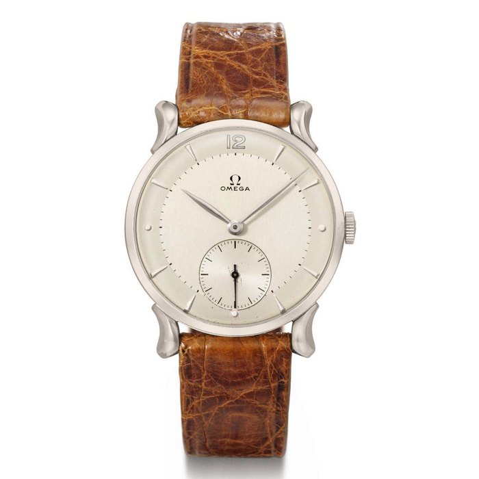 Omega. A rare and attractive 18K white gold wristwatch with two-tone silvered dial and fluted lugs SIGNED OMEGA, REF. OT 14.160, MOVEMENT NO. 11'047'220, CASE NOS. 10'809'870 AND 14'160, MANUFACTURED IN 1947