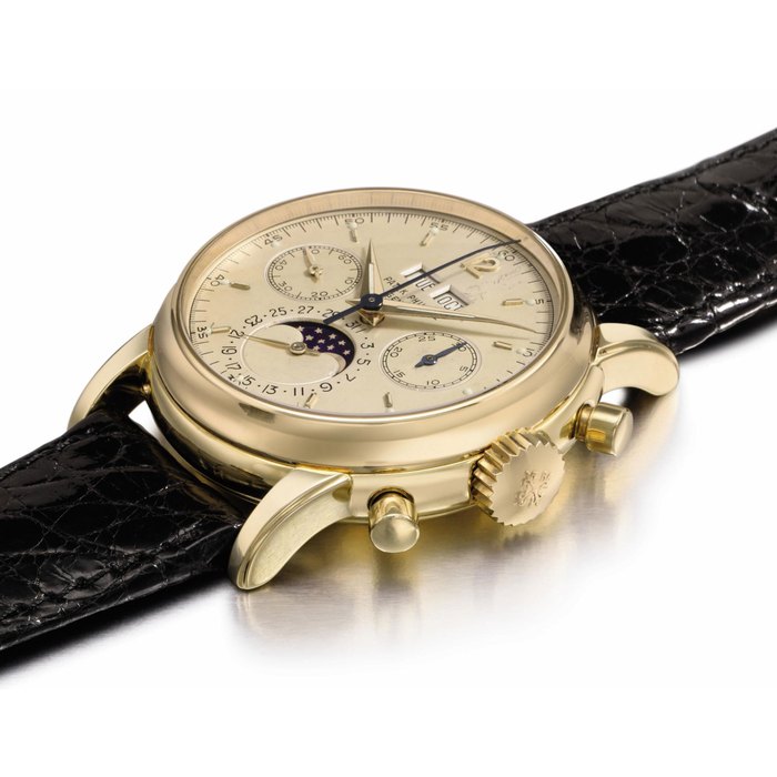 Patek Philippe. A very fine and rare 18K gold perpetual calendar chronograph wristwatch with moon phases and extremely rare transitional dial featuring luminous hour markers and hands SIGNED PATEK PHILIPPE, GENÈVE, REF. 2499, MOVEMENT NO. 868'631, CASE NO. 2'637'693, MANUFACTURED IN 1957