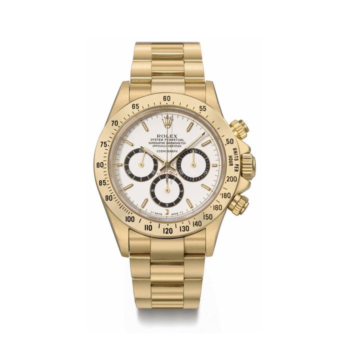 Rolex Rolex. An 18K gold automatic chronograph wristwatch with bracelet SIGNED ROLEX, OYSTER PERPETUAL, COSMOGRAPH, DAYTONA, REF. 16528, CASE NO. R883507, MANUFACTURED IN 1988 · 16528