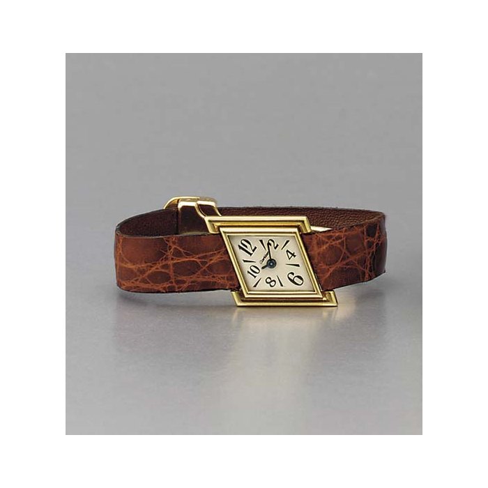 Cartier. A fine and rare lady's 18K gold asymmetrical backwound wristwatch SIGNED CARTIER, MOVEMENT SIGNED LECOULTRE, CIRCA 1972