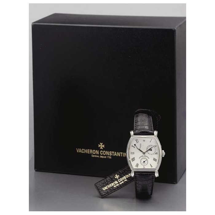 Vacheron Constantin. A platinum tonneau-shaped self-winding wristwatch with power reserve and date SIGNED VACHERON CONSTANTIN, GENEVE, JUBILEE 240 MODEL, MOVEMENT NO. 840931, CASE NO. 664281, CIRCA 1995