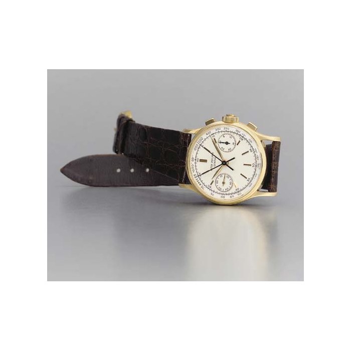 Patek Philippe. An important and very rare 18K gold split second chronograph wristwatch SIGNED PATEK PHILIPPE, GENEVE, MOVEMENT NO. 869155, CASE NO. 2642007, REF. 1436, CIRCA 1965