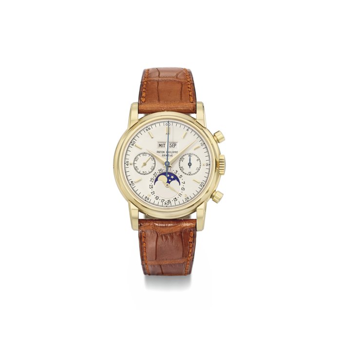 Patek Philippe. A very fine and rare 18K gold perpetual calendar chronograph wristwatch with moon phases SIGNED PATEK PHILIPPE, GENÈVE, REF. 2499, MOVEMENT NO. 869'448, CASE NO. 2'700'400, MANUFACTURED IN 1973