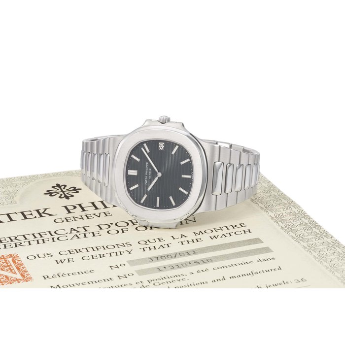 Patek Philippe. A rare stainless steel automatic wristwatch with date, bracelet, original certificate and box SIGNED PATEK PHILIPPE, GENÈVE, NAUTILUS MODEL, REF. 3700/11, MOVEMENT NO. 1'310'510, CASE NO. 541'007, MANUFACTURED IN 1982