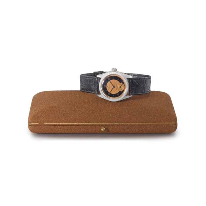 Rolex. An unusual and highly rare stainless steel retailer demonstration wristwatch with copper and black dial, glazed back and box SIGNED ROLEX, ROYAL, PRECISION, REF. 4270, CIRCA 1940