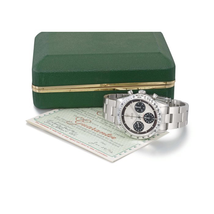 Rolex Rolex. A fine and rare stainless steel chronograph wristwatch with cream dial and bracelet SIGNED ROLEX, COSMOGRAPH DAYTONA, REF. 6239, CASE NO. 2004613, PAUL NEWMAN MODEL, MANUFACTURED IN 1969 · 6239