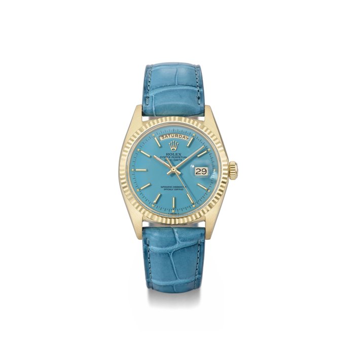 Rolex. An attractive 18K gold automatic calendar wristwatch with sweep centre seconds and turquoise blue lacquered dial SIGNED ROLEX, OYSTER PERPETUAL, DAY-DATE, REF. 1803, CASE NO. 2'384'223, MANUFACTURED IN 1970