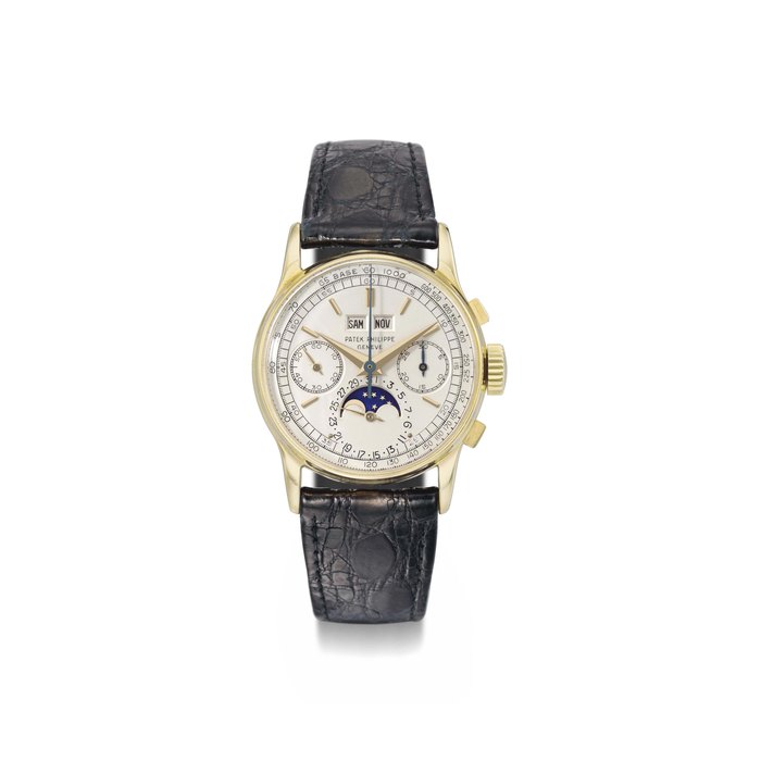 Patek Philippe. A highly exclusive and important 18K gold perpetual calendar chronograph wristwatch with moon phases and unusual dial SIGNED PATEK PHILIPPE, GENÈVE, REF. 1518, MOVEMENT NO. 867'733, CASE NO. 659'598, MANUFACTURED IN 1949