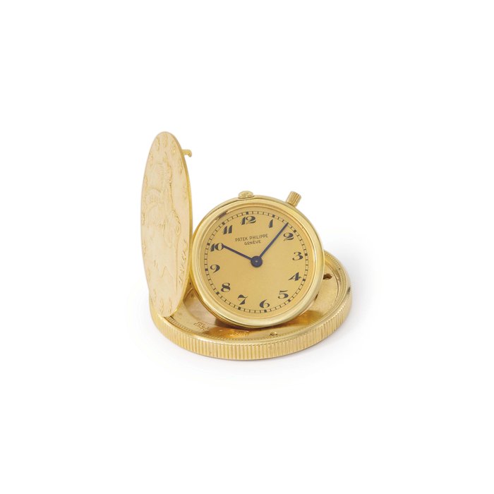 Patek Philippe. A fine and rare 18K gold United States of America Twenty Dollars Coin watch with champagne dial and Breguet numerals SIGNED PATEK PHILIPPE, GENÈVE, REF. 803, MOVEMENT NO. 861'212, CASE NO. 513'128, MANUFACTURED IN 1952