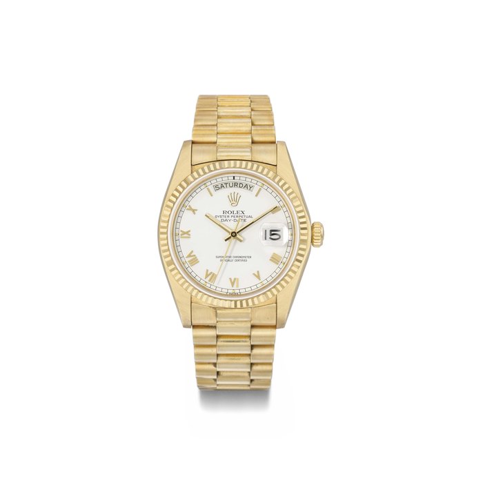 Rolex. An 18K gold automatic wristwatch with sweep centre seconds, day, date and bracelet SIGNED ROLEX, OYSTER PERPETUAL, DAY-DATE, REF. 18038, 5'950'241, MANUFACTURED IN 1979