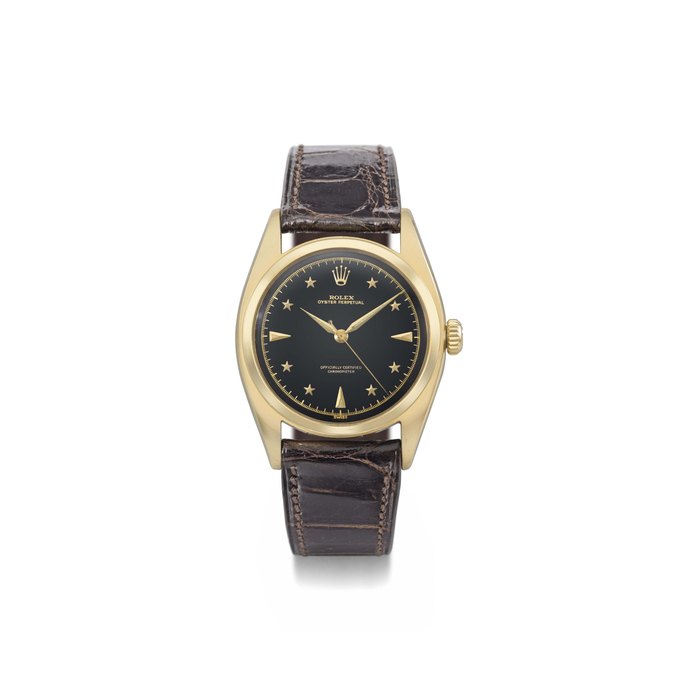 Rolex. A very rare and elegant 18K gold automatic wristwatch with black lacquer dial, sweep centre seconds and star numerals SIGNED ROLEX, OYSTER PERPETUAL, REF. 6098, CASE NO. 716'115, MANUFACTURED IN 1951