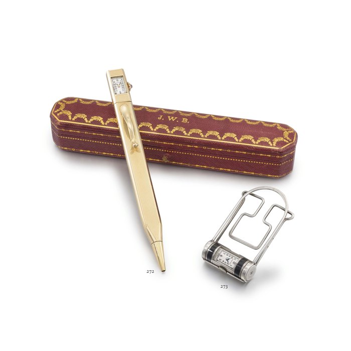 Cartier. An unusual silver and enamel Art Deco tubular-shaped watch with money clip SIGNED CARTIER, NO. 08494, MOVEMENT SIGNED SIGMA WATCH CO., CIRCA 1930