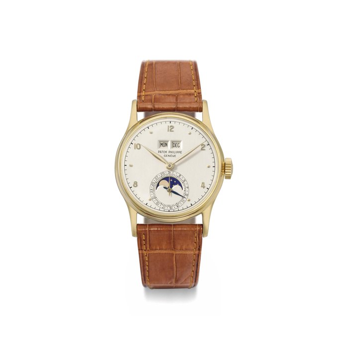 Patek Philippe. A fine and rare 18K gold perpetual calendar wristwatch with moon phases SIGNED PATEK PHILIPPE, GENÈVE, REF. 1526, MOVEMENT NO. 960'815, CASE NO. 652'008, MANUFACTURED IN 1948