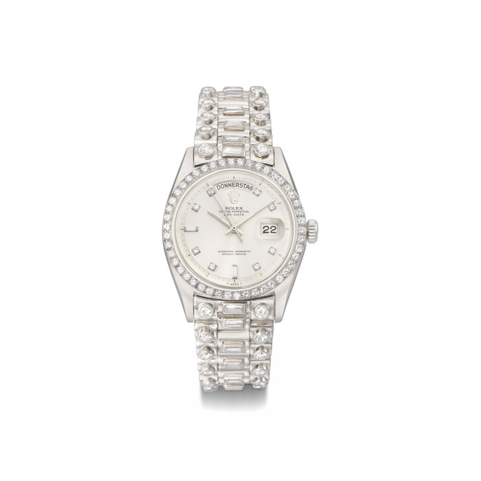 Rolex. An extremely rare and attractive platinum and diamond-set automatic calendar wristwatch with sweep centre seconds, bracelet and original box SIGNED ROLEX, OYSTER PERPETUAL, DAY-DATE, REF. 1804, CASE NO. 2'541'217, MANUFACTURED IN 1971