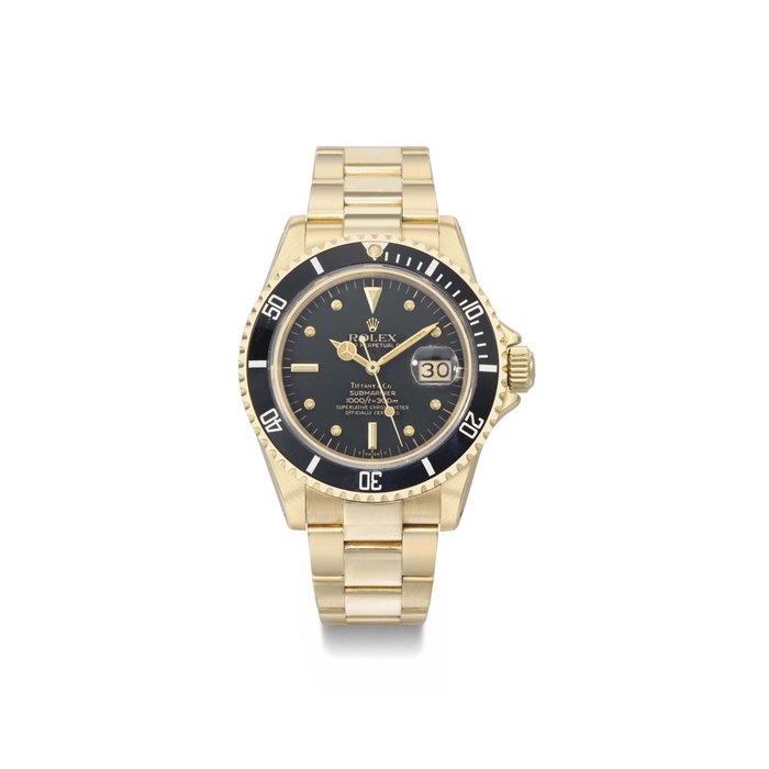 Rolex, made for Tiffany & Co. A rare and attractive 18K gold automatic wristwatch with sweep centre seconds, date and bracelet SIGNED ROLEX, OYSTER PERPETUAL DATE, SUBMARINER, RETAILED BY TIFFANY & CO., REF. 16808, 1000FT=300M, CASE NO. 7'066'765, MANUFACTURED IN 1982
