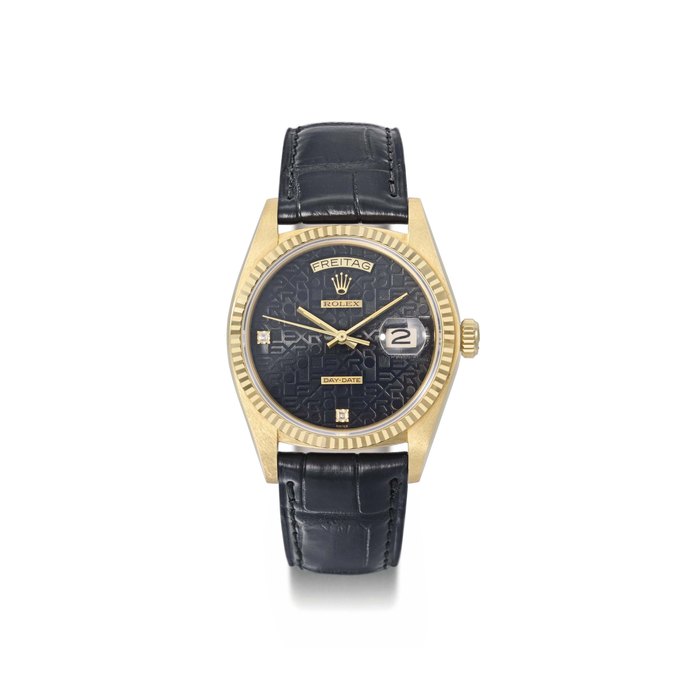 Rolex. An attractive and unusual 18K gold automatic calendar wristwatch with sweep centre seconds SIGNED ROLEX, DAY-DATE, REF. 18038, CASE NO. 5'989'522, CIRCA 1981