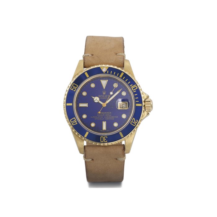Rolex. A rare and attractive 18K gold wristwatch with sweep centre seconds, date and lapis lazuli dial SIGNED ROLEX, OYSTER PERPETUAL DATE, SUBMARINER, 1000FT=300M, SUPERLATIVE CHRONOMETER OFFICIALLY CERTIFIED, REF. 16618, CASE NO. N269343, MANUFACTURED IN 1992