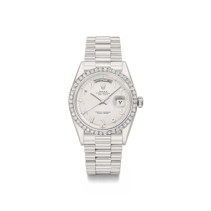 Rolex. A rare and attractive platinum and diamond-set automatic calendar wristwatch with sweep centre seconds and bracelet SIGNED ROLEX, OYSTER PERPETUAL, DAY-DATE, REF. 1804, CASE NO. 1'539'359, MANUFACTURED IN 1967
