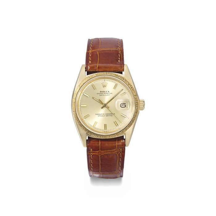 Rolex. An attractive and rare 18K gold automatic wristwatch with sweep centre seconds, date and bark-finish bezel SIGNED ROLEX, OYSTER PERPETUAL, DATEJUST, REF. 1607/1601, CASE NO. 2909347, MANUFACTURED IN 1972