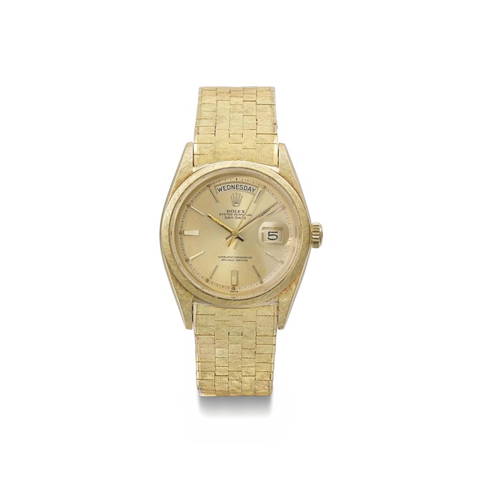 Rolex. An attractive and rare 18K gold automatic calendar wristwatch with sweep centre seconds, gilt dial and bracelet SIGNED ROLEX, OYSTER-PERPETUAL, DAY-DATE, REF. 1806, CASE NO. 916143, MANUFACTURED IN 1963