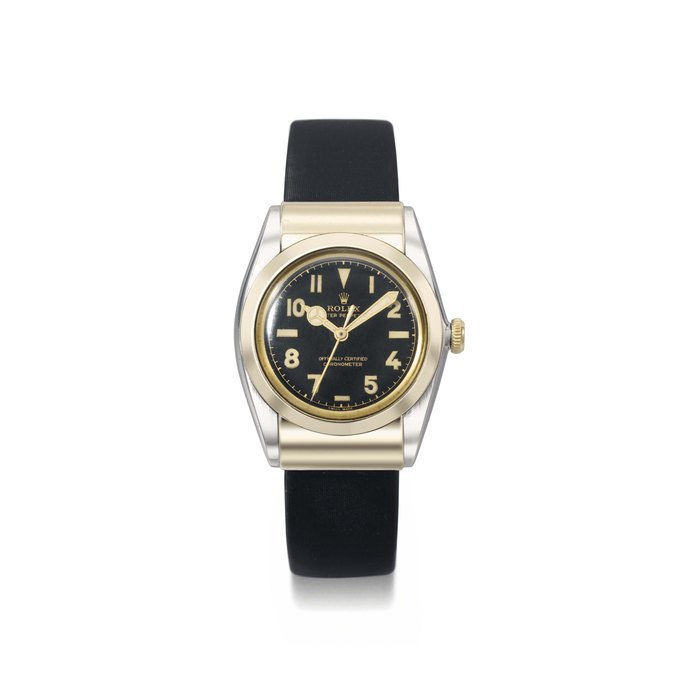 Rolex. A fine and rare stainless steel and gold automatic bubble back wristwatch with black dial, sweep centre seconds, hooded lugs and box SIGNED ROLEX, OYSTER PERPETUAL, OFFICIALLY CERTIFIED CHRONOMETER, REF. 3065, CASE NO. 375'426, MANUFACTURED IN 1957