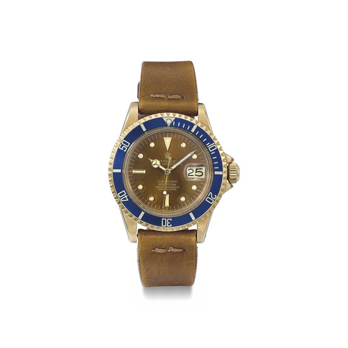 Rolex. An attractive 18K gold automatic wristwatch with sweep centre seconds, date, orangy-brown dial and blue bezel SIGNED ROLEX, OYSTER PERPETUAL DATE, SUBMARINER, 660FT=200M, REF. 1680, CASE NO. 5'634'171, MANUFACTURED IN 1978