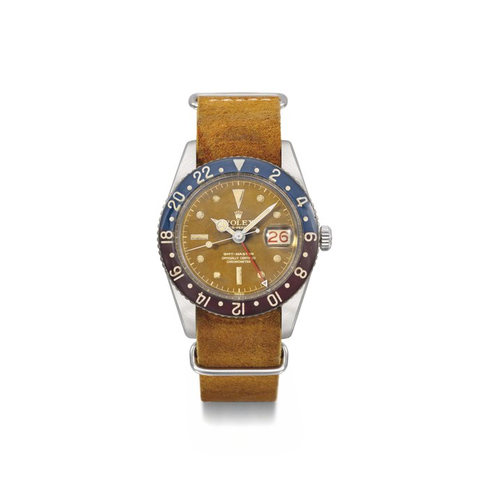 Rolex. A very rare, early and attractive stainless steel automatic dual time wristwatch with sweep centre seconds, tropical dial, red date and bakelite bezel SIGNED ROLEX, OYSTER PERPETUAL, GMT-MASTER, REF. 6542, CASE NO. 427'551, CIRCA 1958