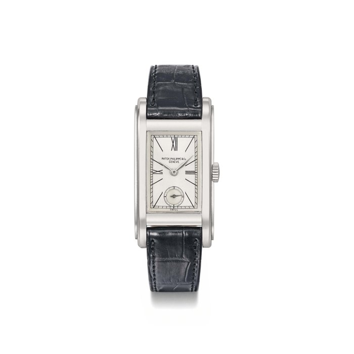 Patek Philippe. A rare and unusual stainless steel rectangular curved wristwatch with two-tone silvered dial SIGNED PATEK PHILIPPE & CO., GENÈVE, REF. 492, MOVEMENT NO. 831'850, CASE NO. 614'913, MANUFACTURED IN 1937