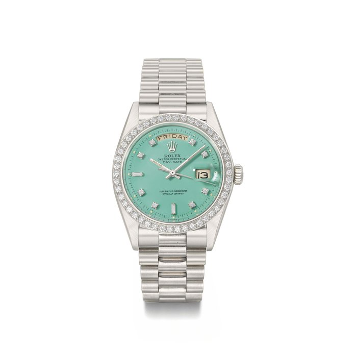 Rolex. A rare and attractive 18K white and diamonds gold automatic calendar wristwatch with sweep centre seconds, bracelet and mint green lacquered dial SIGNED ROLEX, OYSTER PERPETUAL, DAY-DATE, REF. 1804, CASE NO. 5'349'522, MANUFACTURED IN 1977