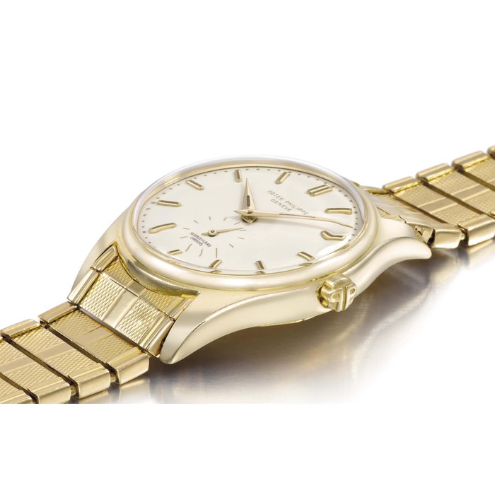 Patek Philippe. A very fine and rare 18K gold automatic wristwatch with luminous enamel dial, luminous hands and gold bracelet, retailed by Serpico y Laino SIGNED PATEK PHILIPPE, GENÈVE, RETAILED BY SERPICO Y LAINO, CARACAS, REF. 2526, MOVEMENT NO. 764'487, CASE NO. 698'194, MANUFACTURED IN 1957