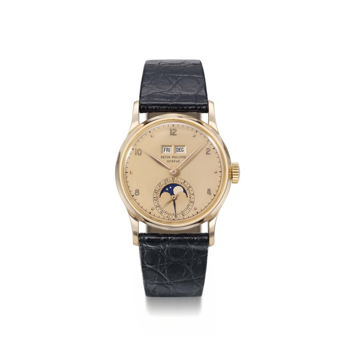 Patek Philippe. A very fine and rare 18K pink gold perpetual calendar wristwatch with phases of the moon and pink dial SIGNED PATEK PHILIPPE, GENÈVE, REF. 1526, MOVEMENT NO. 962'280, CASE NO. 653'860, MANUFACTURED IN 1948
