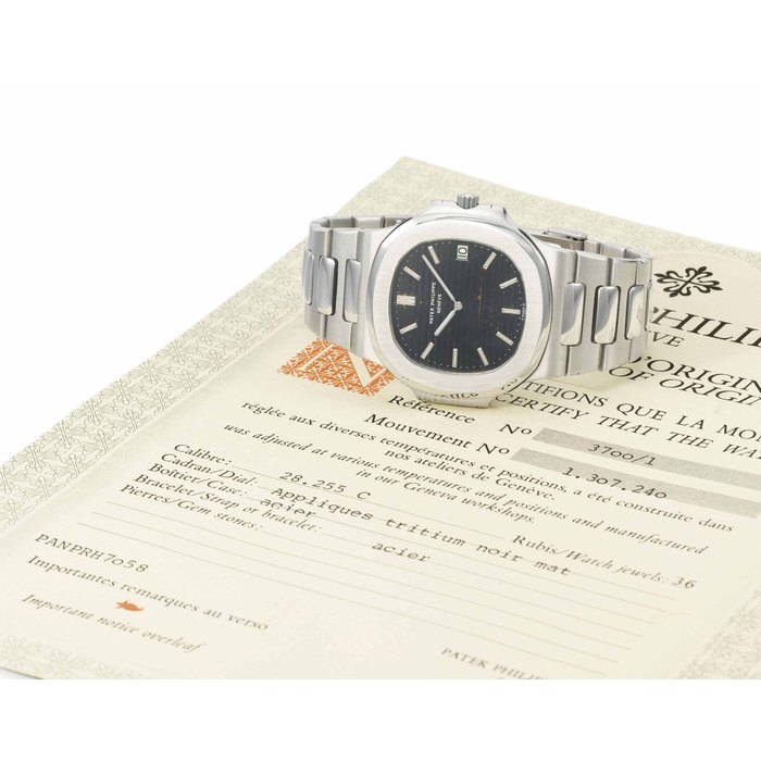 Patek Philippe. A fine and large stainless steel automatic wristwatch, date, bracelet and original certificate SIGNED PATEK PHILIPPE, GENÈVE, NAUTILUS MODEL, REF. 3700/1, MOVEMENT NO. 1'307'240, CASE NO. 538'520, MANUFACTURED IN 1980