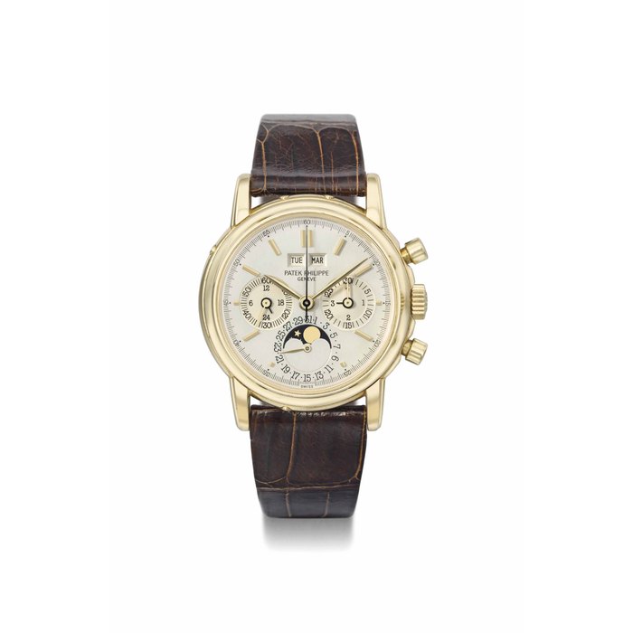 Patek Philippe. A fine and rare 18k gold perpetual calendar chronograph wristwatch with two-tone dial, moon phases and snap on back SIGNED PATEK PHILIPPE, GENÈVE, REF. 3970, MOVEMENT NO. 875'006, CASE NO. 2'824'116, MANUFACTURED IN 1986