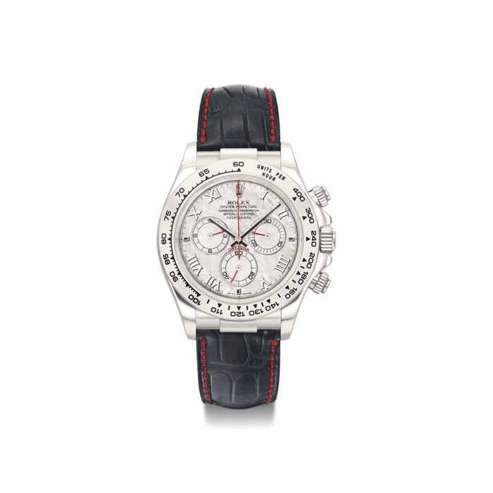 Rolex. A rare and attractive 18K white gold automatic chronograph wristwatch with meteorite dial, guarantee and box SIGNED ROLEX, OYSTER PERPETUAL, COSMOGRAPH, DAYTONA, REF. 116519, CASE NO. K936'086, CIRCA 2003