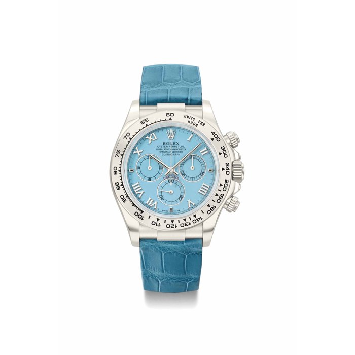Rolex Rolex. A rare and attractive 18K white gold automatic chronograph wristwatch with blue hard stone dial, guarantee and box SIGNED ROLEX, OYSTER PERPETUAL, COSMOGRAPH, DAYTONA, REF. 116519, CASE NO. Y378'139, CIRCA 2002, Price & Market Data