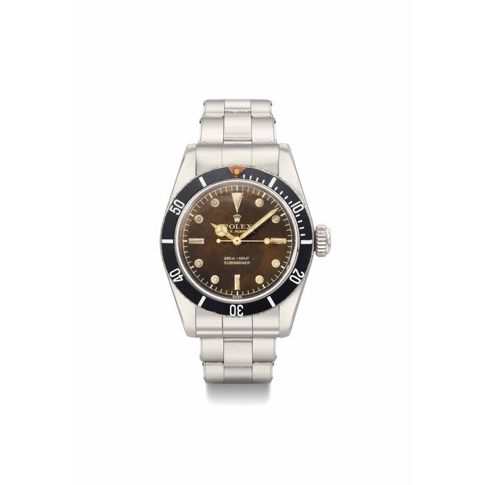 Rolex Rolex. A highly captivating and extremely rare stainless steel automatic wristwatch with sweep centre seconds, tropical dial, and bracelet SIGNED ROLEX, OYSTER PERPETUAL, 200M=660FT, SUBMARINER, REF. 6538, CASE NO. 383'885, CIRCA 1958