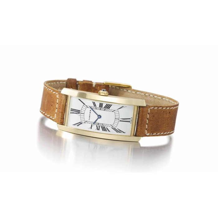 Cartier Cartier. A fine and rare large 18k gold rectangular curved wristwatch SIGNED CARTIER, PARIS, TANK CINTREE MODEL, CASE NUMBERED 034841 AND 65045, CIRCA 1970