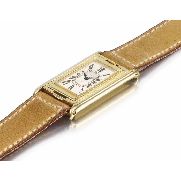 Cartier. A very rare 18k Gold Rectangular Reversible Wristwatch SIGNED CARTIER, FRANCE, TANK BASCULANTE MODEL, MOVEMENT SIGNED EUROPEAN WATCH & CLOCK CO. INC., CASE NO. 32359, CIRCA 1930