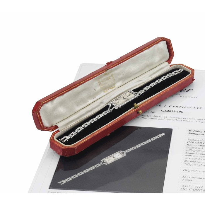 Cartier. A very fine and rare rectangular platinum and diamond bracelet watch with original box and Cartier Certificate SIGNED CARTIER, PARIS, MOVEMENT NO. 14208, CASE NO. 6435 4114 14208 5644, MANUFACTURED IN 1914
