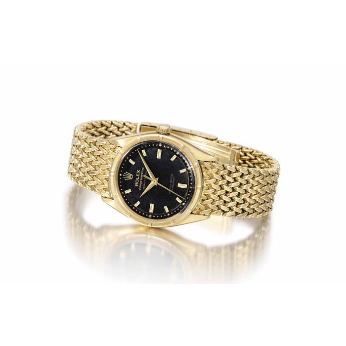 Rolex. An attractive and rare 18k gold automatic wristwatch with sweep centre seconds and woven bracelet SIGNED ROLEX, OYSTER PERPETUAL, RETAILED BY SERPICO Y LAINO, OFFICIALLY CERTIFIED CHRONOMETER, REF. 6569, CASE NO. 158'032, MANUFACTURED IN 1956
