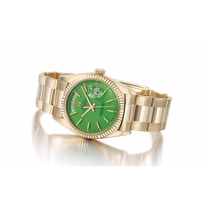 Rolex. A very rare 18K pink gold automatic calendar wristwatch with sweep centre seconds, bracelet and green lacquer dial SIGNED ROLEX, OYSTER PERPETUAL DAY-DATE, REF. 1803, CASE NO. 3'601'002, CIRCA 1973