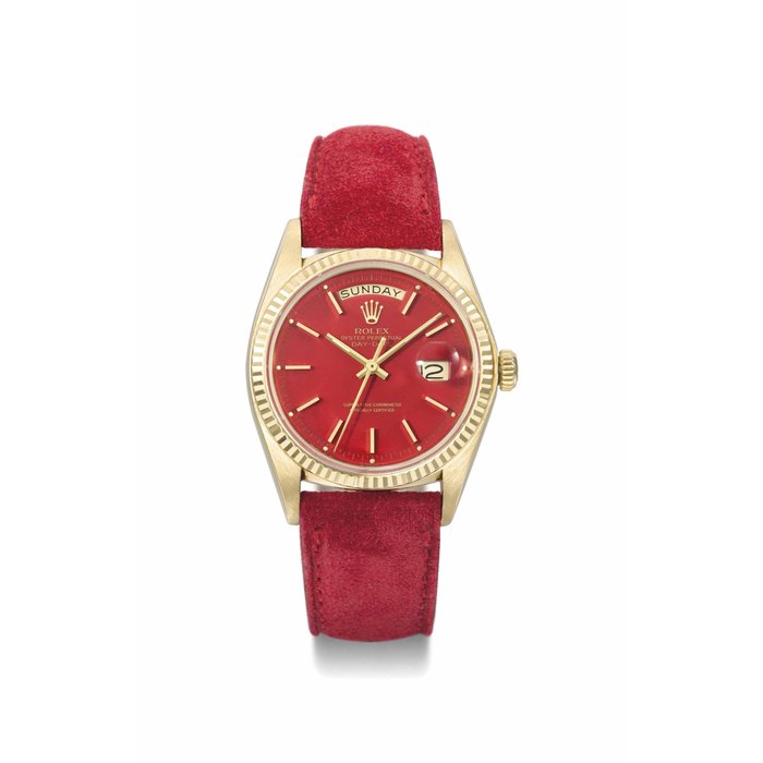 Rolex. A rare and attractive 18K gold automatic calendar wristwatch with red lacquer dial SIGNED ROLEX, OYSTER PERPETUAL, DAY-DATE, REF. 1803, CASE NO. 5'005'234, CIRCA 1977